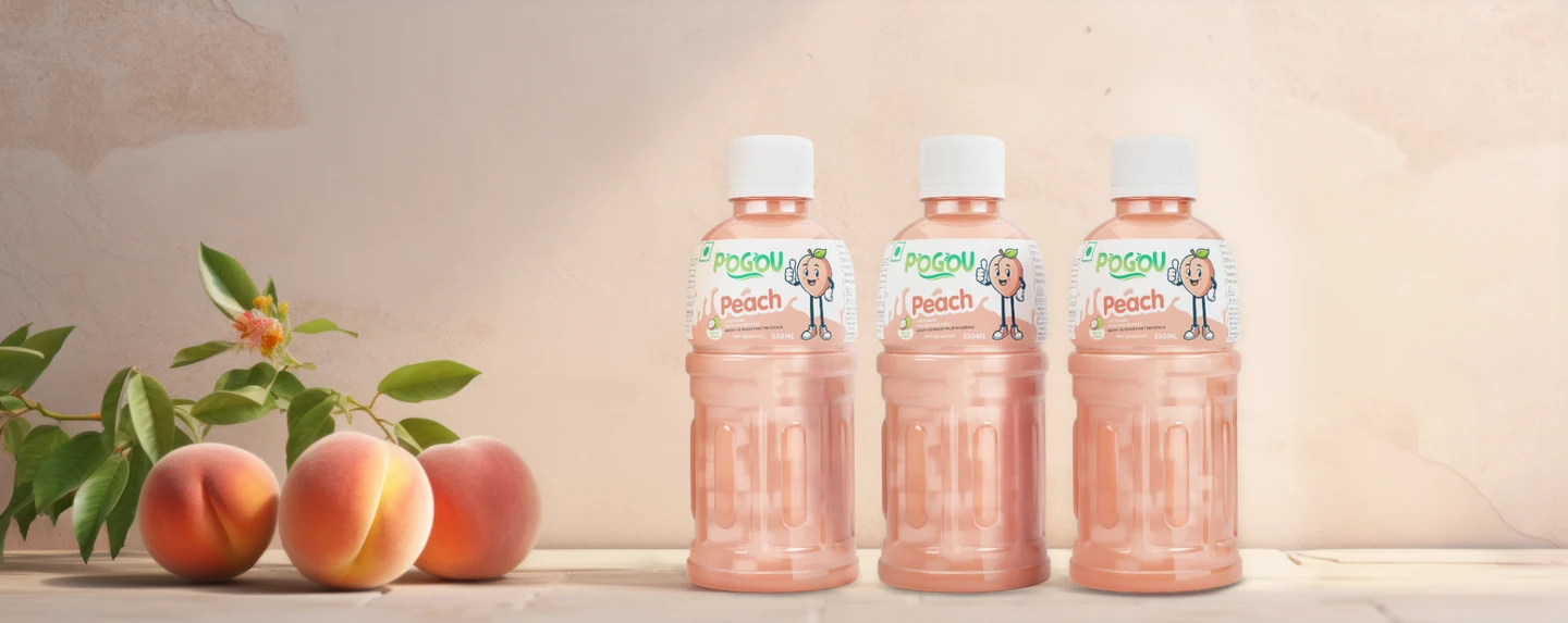 Three Pogou peach bottles with peach fruit