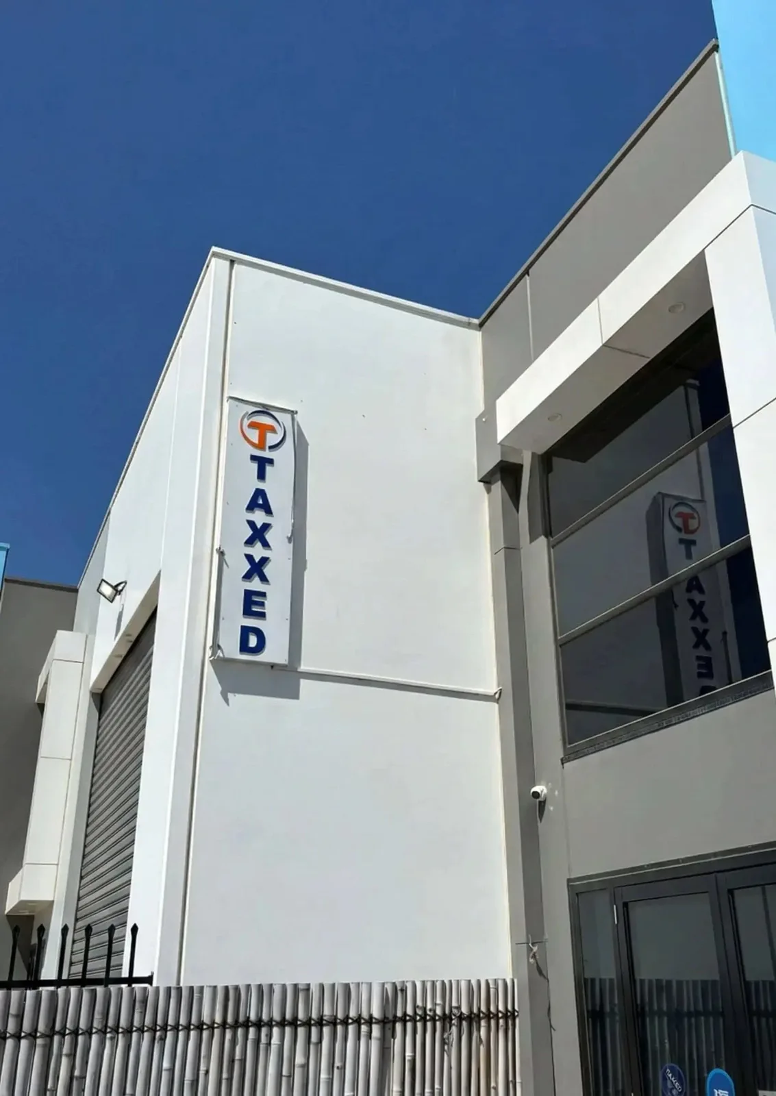 Taxxed · Exterior signage